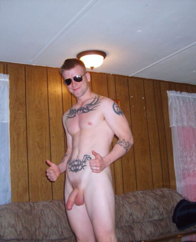 Tattooed Guy Showing His Soft Schlong.